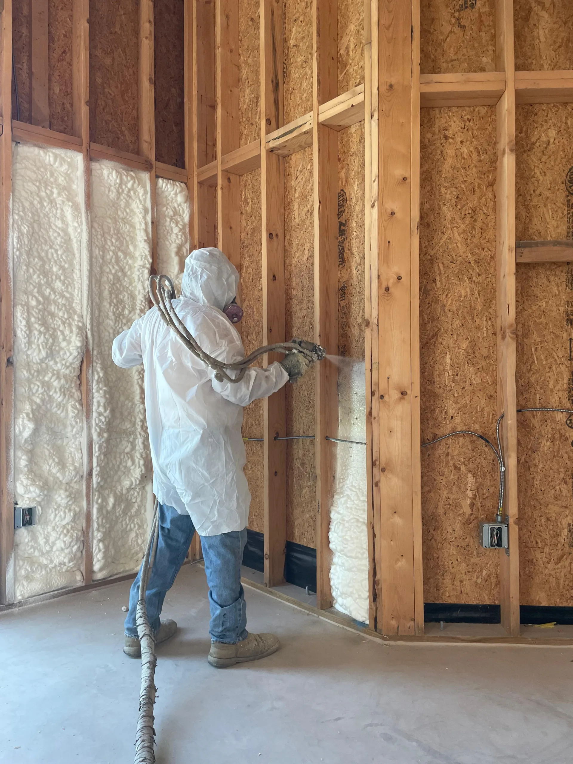 Spray foam insulation installed at a Bulverde TX home roofline